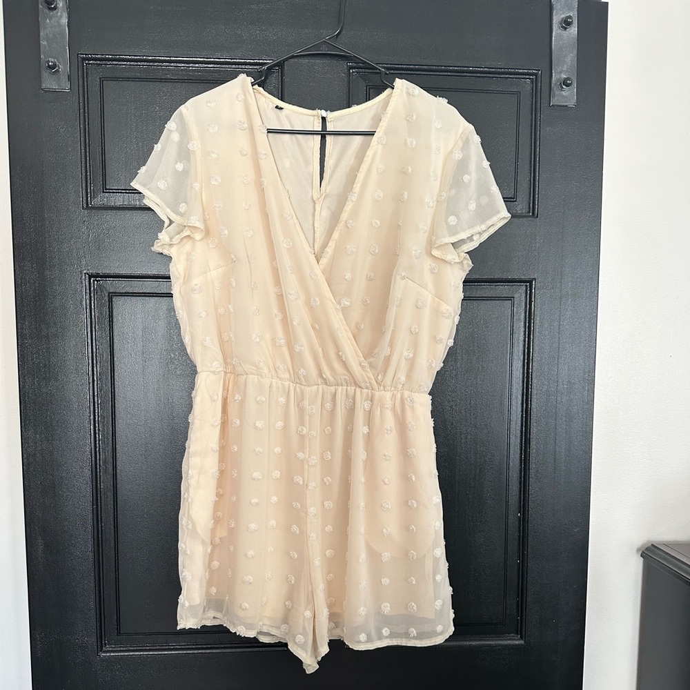 White/cream romper. Size L.